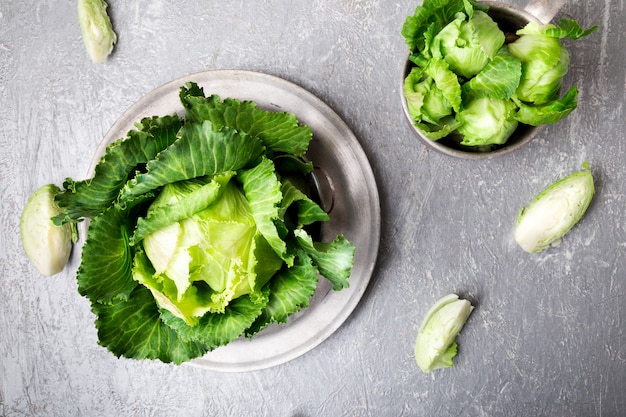 Fresh green cabbage in metal plate