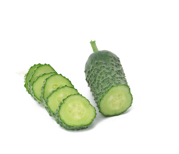 Fresh green cucumber sliced on white background