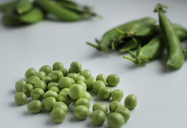 Fresh green peas in a pod and with peas