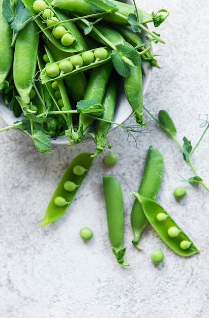 Fresh green peas pods and green peas