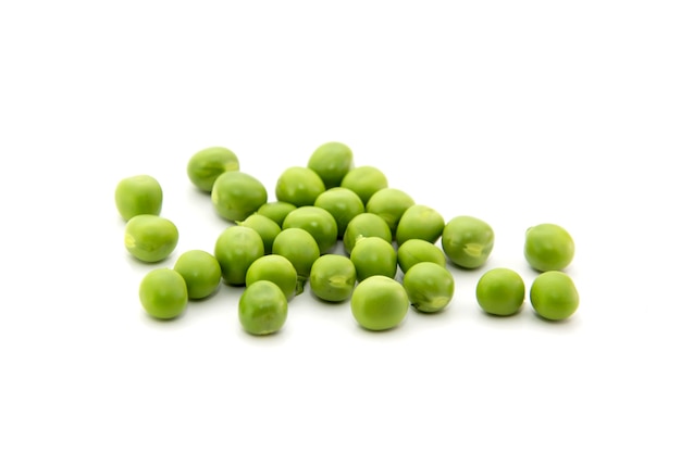 Fresh green peas with coriander leaves isolated on a white