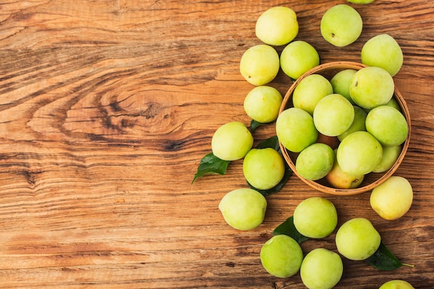 Fresh green plum and preserved green plum