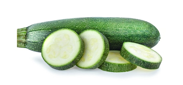 Fresh green zucchini with slice isolated on white background