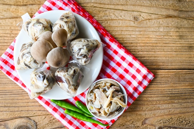 Fresh grey oyster mushroom on plate cooked oyster mushroom for cooking food processed food street mushroom package