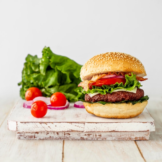 Fresh hamburger on wooden board