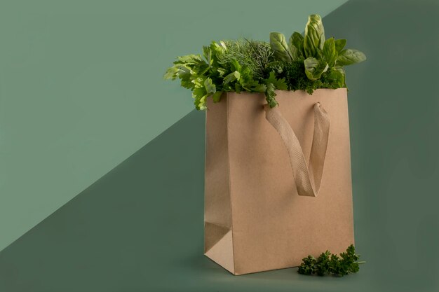 Fresh herbs in a paper bag