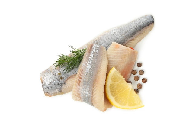 Fresh herring fish slices and spices isolated on white background