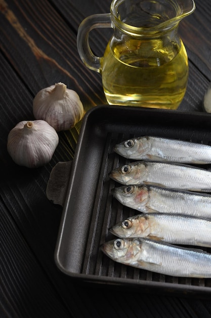 Fresh herring on rustic wooden background close up shot