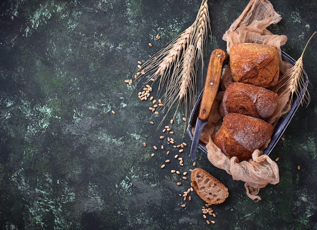 Fresh homemade buns on rustic background