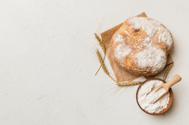 Fresh homemade crisp round bread on napkin top view Healthy unleavened bread French bread Top view Bakery products