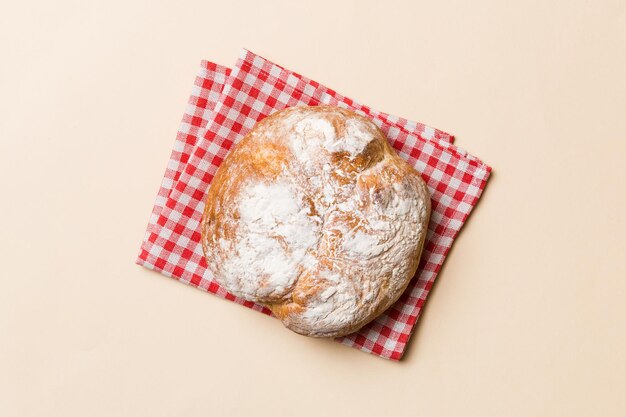 Fresh homemade crisp round bread on napkin top view Healthy unleavened bread French bread Top view Bakery products