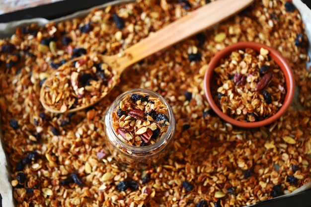 Fresh homemade granola. Healthy breakfast or snack. Cooking granola.