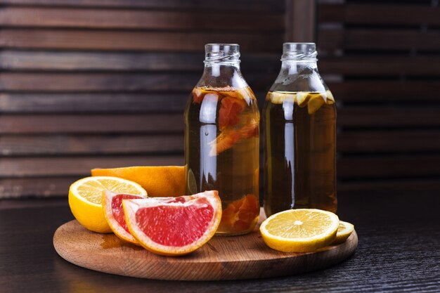 Fresh homemade kombucha drink with lemon and grapefruit