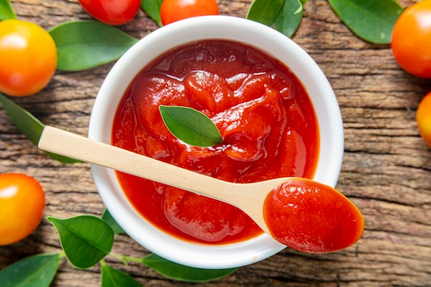 Fresh homemade tomato sauce in a white bowl