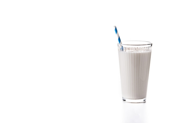 Fresh horchata with cinnamon in glass isolated on white background