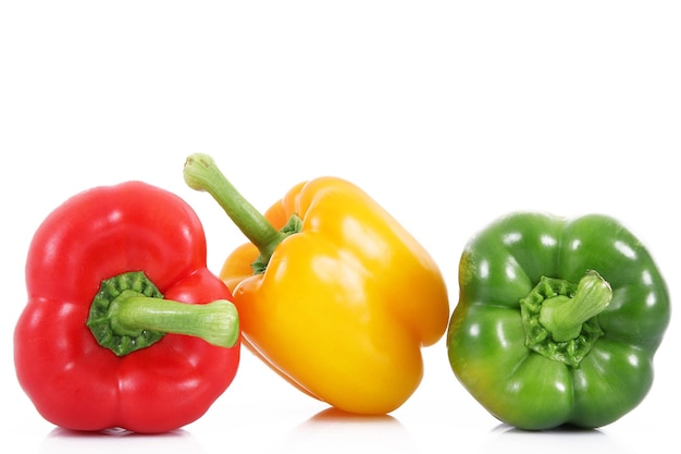 Fresh hot peppers on white background