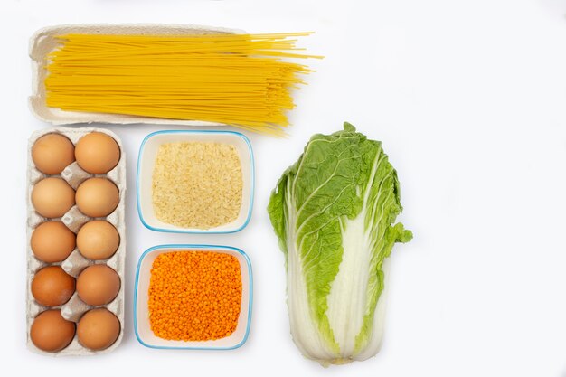 Fresh ingredients for cooking on white background