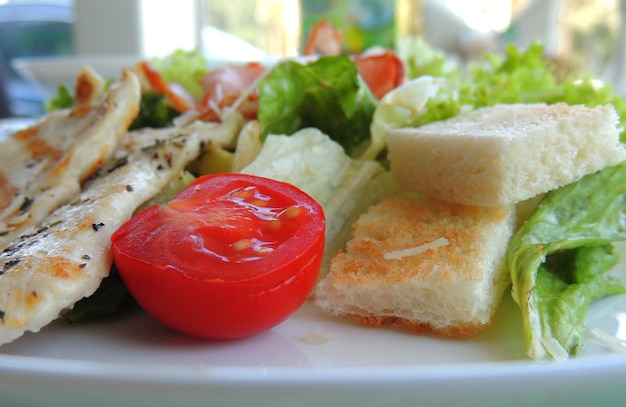 Fresh ingredients of salad with vegetables and toasted bread