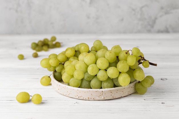 fresh juicy black and green grape on table