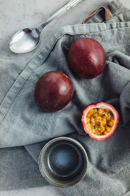 Fresh and juicy raw passion fruits on a table