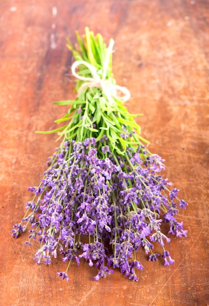 Fresh lavender over wooden background Summer floral background with lavender flowers