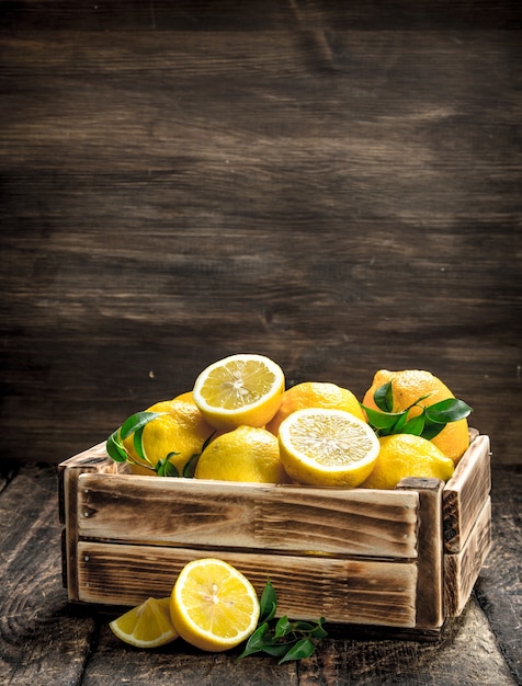 Fresh lemons in an old box