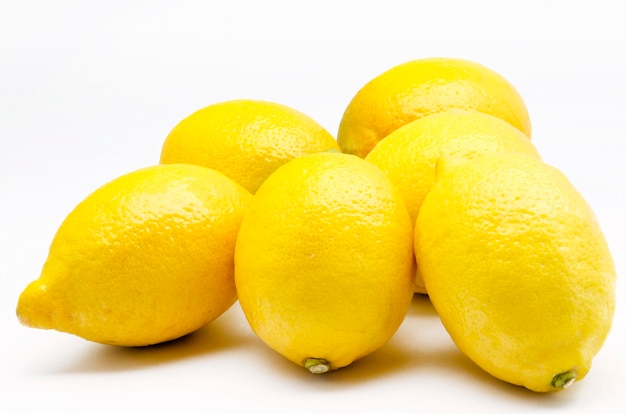 Fresh lemons on white