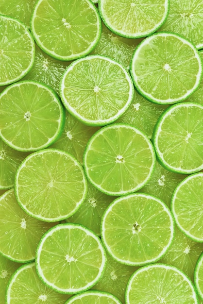 Fresh lime slices as a background.