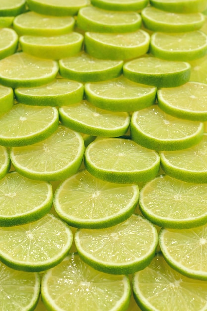 Photo fresh lime slices as a background