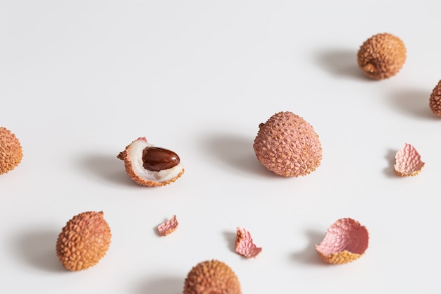 Fresh Lychee fruit on light table with sunlight