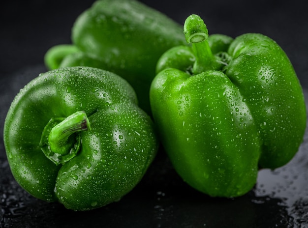 Fresh made Green paprika on a slate slab closeup shot selective focus