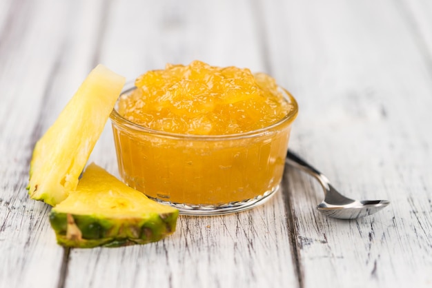 Fresh made Pineapple Jam on a rustic background