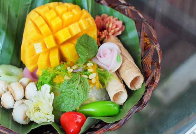 Fresh mango and sticky rice. Mango sliced served with sticky rice and thai dessert.