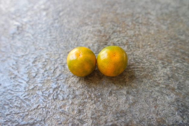 fresh mini orange fruit at the backyard garden in summer time day