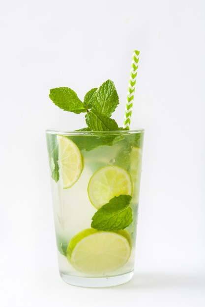 fresh mojito cocktail in glass on white