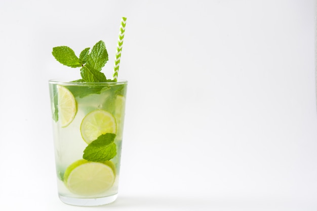 fresh mojito cocktail in glass on white