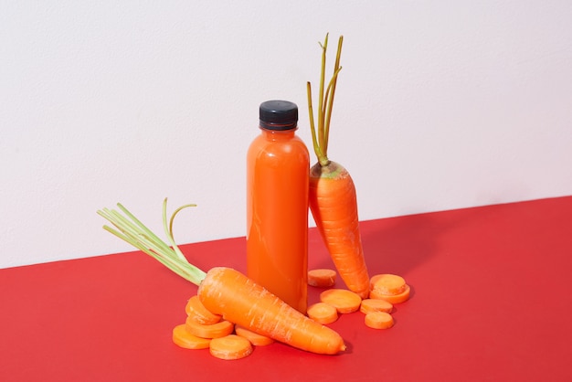 Fresh natural carrot juice on table Healthy drink