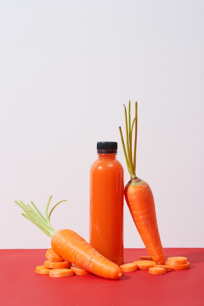 Fresh natural carrot juice on table. Healthy drink.