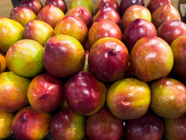 Fresh nectarines in the supermarket Vegetables and fruits exposed for consumer choice Brazilian hortifrutti