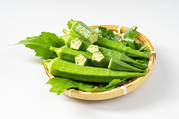 Fresh okra on pure white background