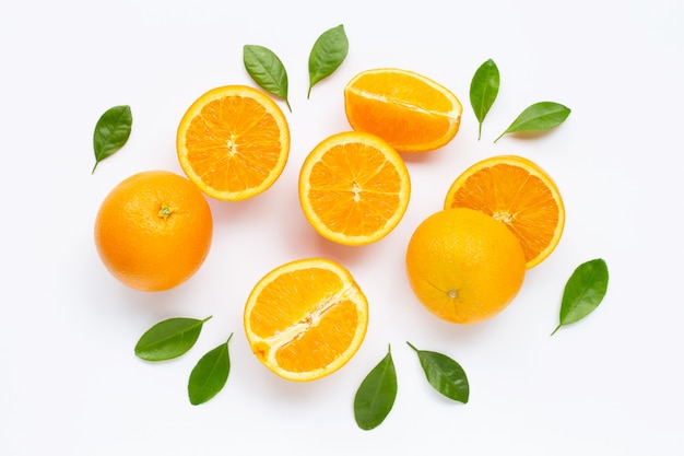 Fresh orange citrus fruit with leaves isolated on white.