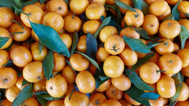 Fresh orange fruits in supermarket for background images