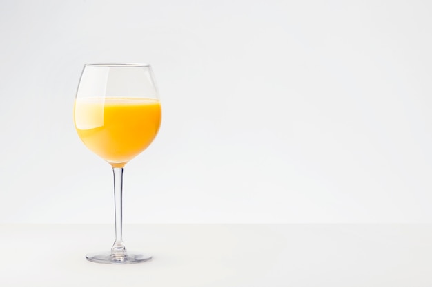 Fresh orange juice with fruits with place for text.