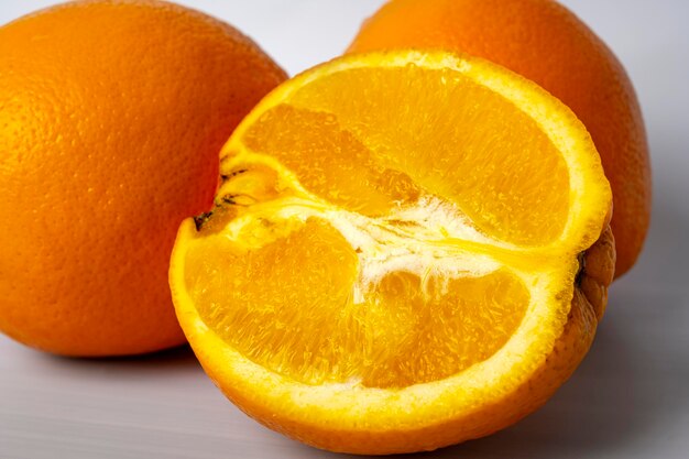 fresh orange on the table. Orange isolated on background