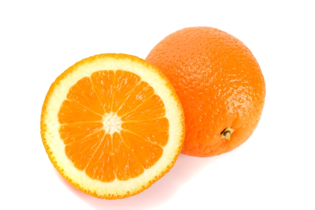 Fresh oranges closeup on white background