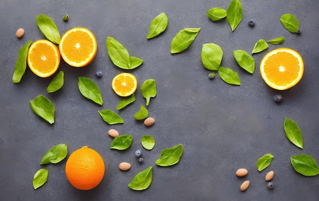 Fresh oranges and green leaves