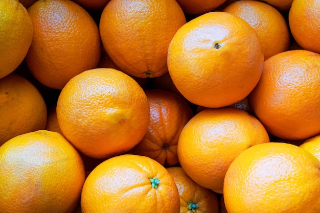 fresh oranges on the market closeup