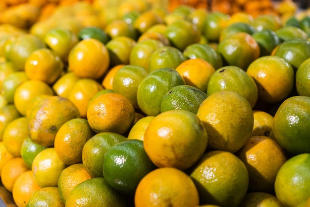 Fresh oranges in the supermarket Vegetables and fruits exposed for the consumer to choose