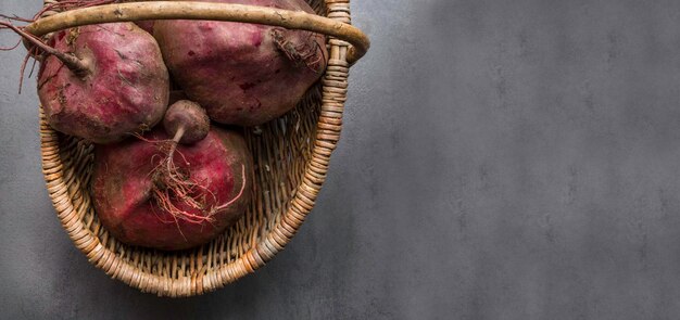 Fresh organic beetroot in a wicker basket banner