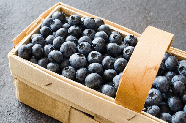 Fresh organic blueberries in basket